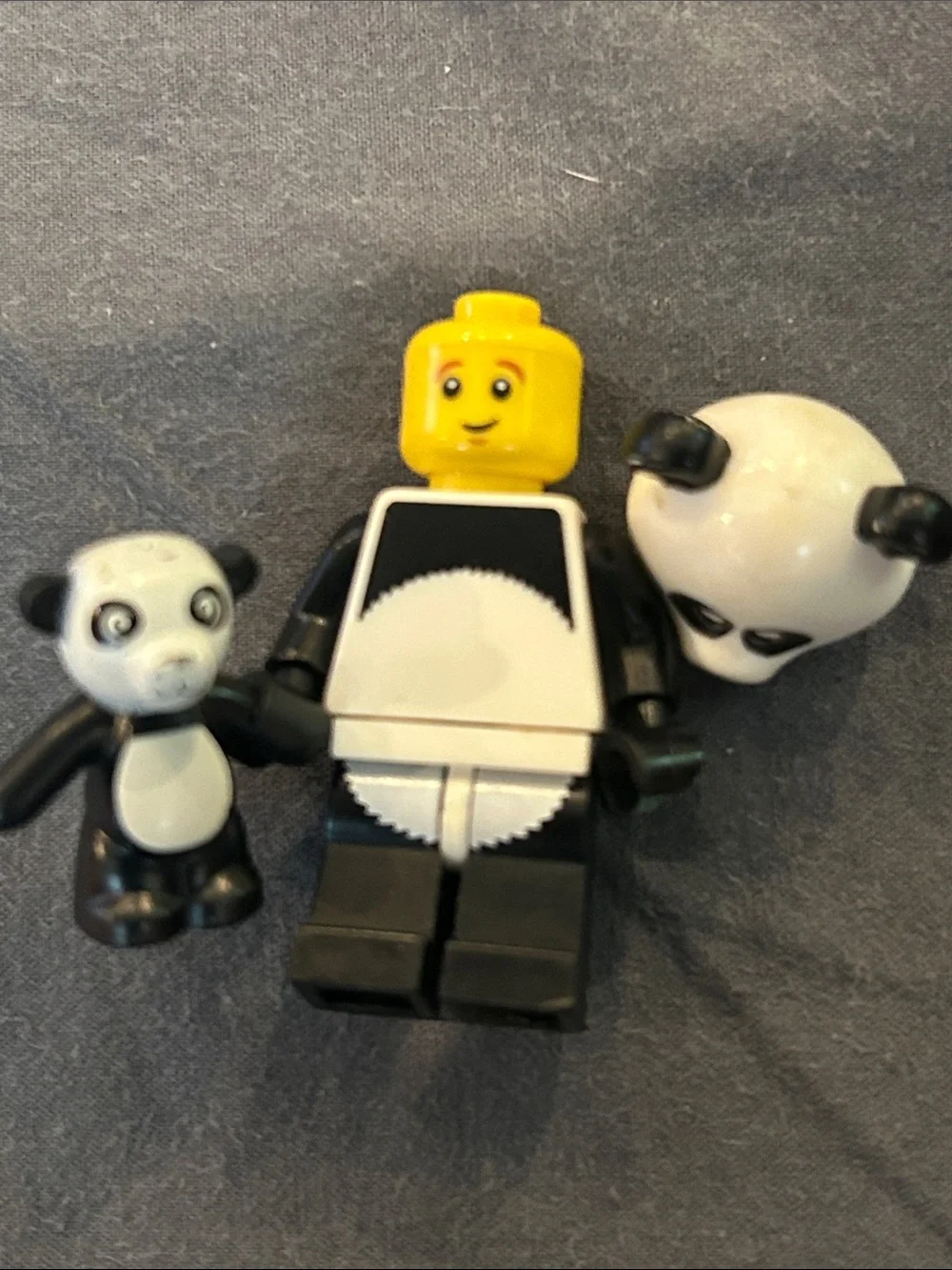 Lego panda costume minifigure with teddy bear